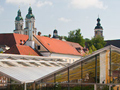 The picturesque view from Kogler's shop overlooking the monastery greenhouse. The steeples of Saint Florian can be seen in the distance.