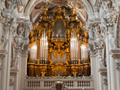 This view shows both the facade of the Great organ and the hole, at the top of the image in the center of the dome, through which the Echo division speaks.